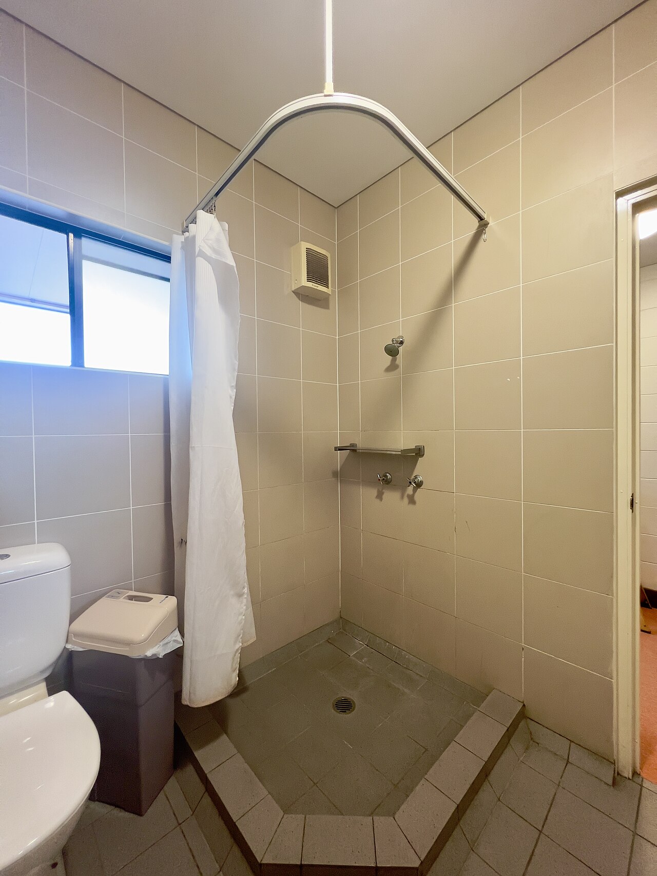 Clean hostel bathroom and washroom facility